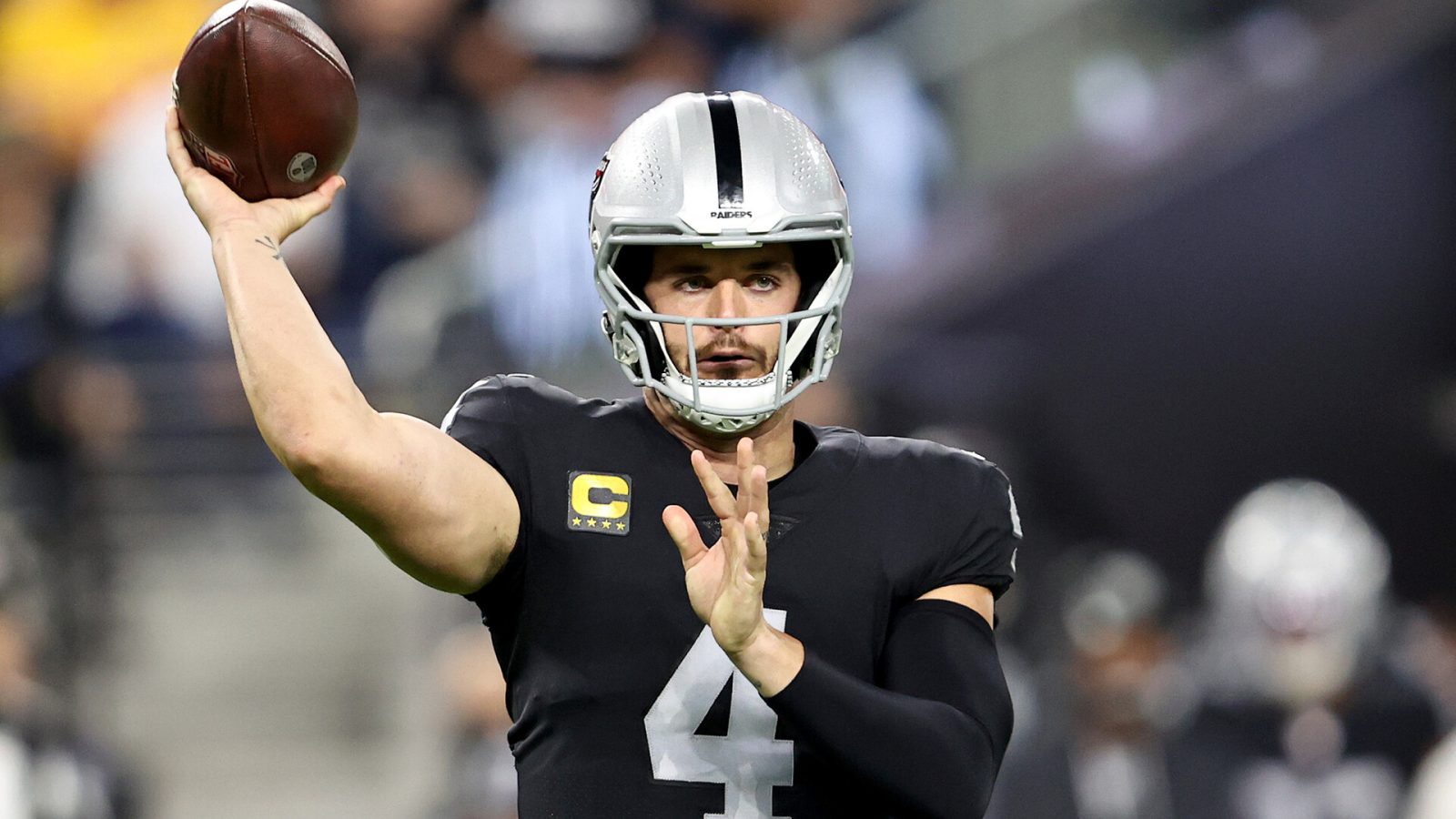 Derek Carr #4 of the Las Vegas Raiders throws the ball to a teammate in the first quarter in the game against the Kansas City Chiefs at Allegiant Stadium on November 14, 2021 in Las Vegas, Nevada.