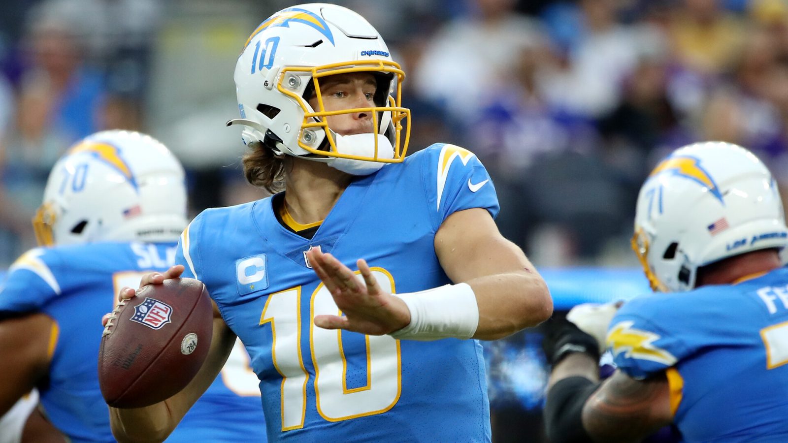Justin Herbert #10 of the Los Angeles Chargers looks to pass the ball during the third quarter against the Minnesota Vikings at SoFi Stadium on November 14, 2021 in Inglewood, California.