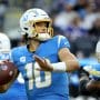 Justin Herbert #10 of the Los Angeles Chargers looks to pass the ball during the third quarter against the Minnesota Vikings at SoFi Stadium on November 14, 2021 in Inglewood, California.