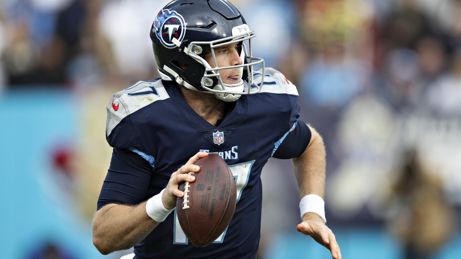 Ryan Tannehill #17 of the Tennessee Titans rolls out to pass during a game against the New Orleans Saints at Nissan Stadium on November 14, 2021 in Nashville, Tennessee. The Titans defeated the Saints 23-21.