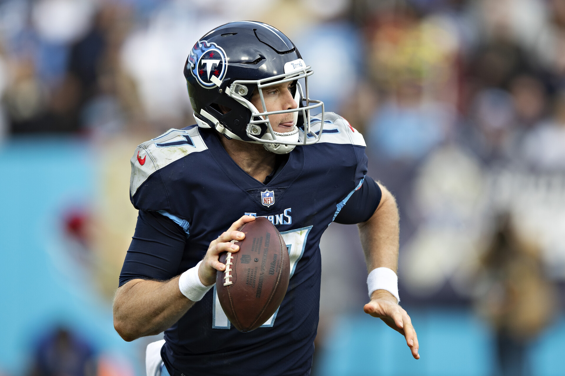 Ryan Tannehill #17 of the Tennessee Titans rolls out to pass during a game against the New Orleans Saints at Nissan Stadium on November 14, 2021 in Nashville, Tennessee. The Titans defeated the Saints 23-21.