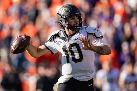 Quarterback Sam Hartman #10 of the Wake Forest Demon Deacons looks to pass against the Clemson Tigers in the fourth quarter during their game at Clemson Memorial Stadium on November 20, 2021 in Clemson, South Carolina.