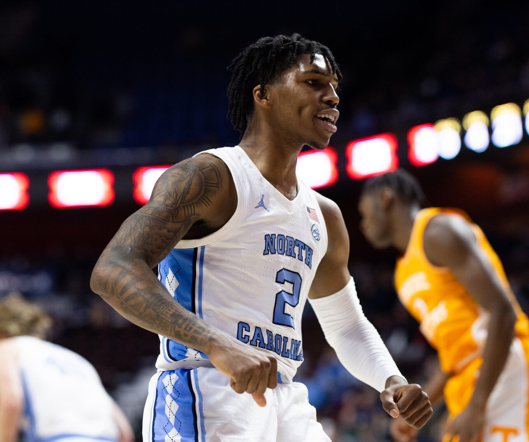 Caleb Love #2 of the University of North Carolina Tar Heels reacts after scoring a basket during the second half of a game against the Tennessee Volunteers at Mohegan Sun Arena on November 21, 2021 in Uncasville, Connecticut.