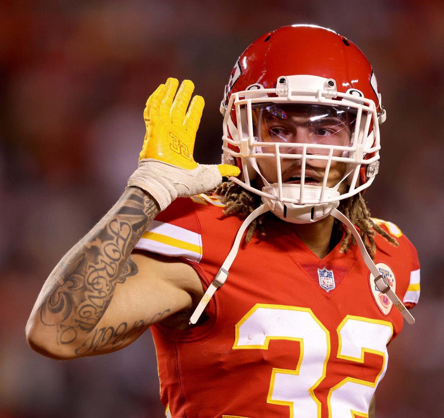 Tyrann Mathieu #32 of the Kansas City Chiefs gestures to the fans after a fourth quarter interception against the Dallas Cowboys at Arrowhead Stadium on November 21, 2021 in Kansas City, Missouri.