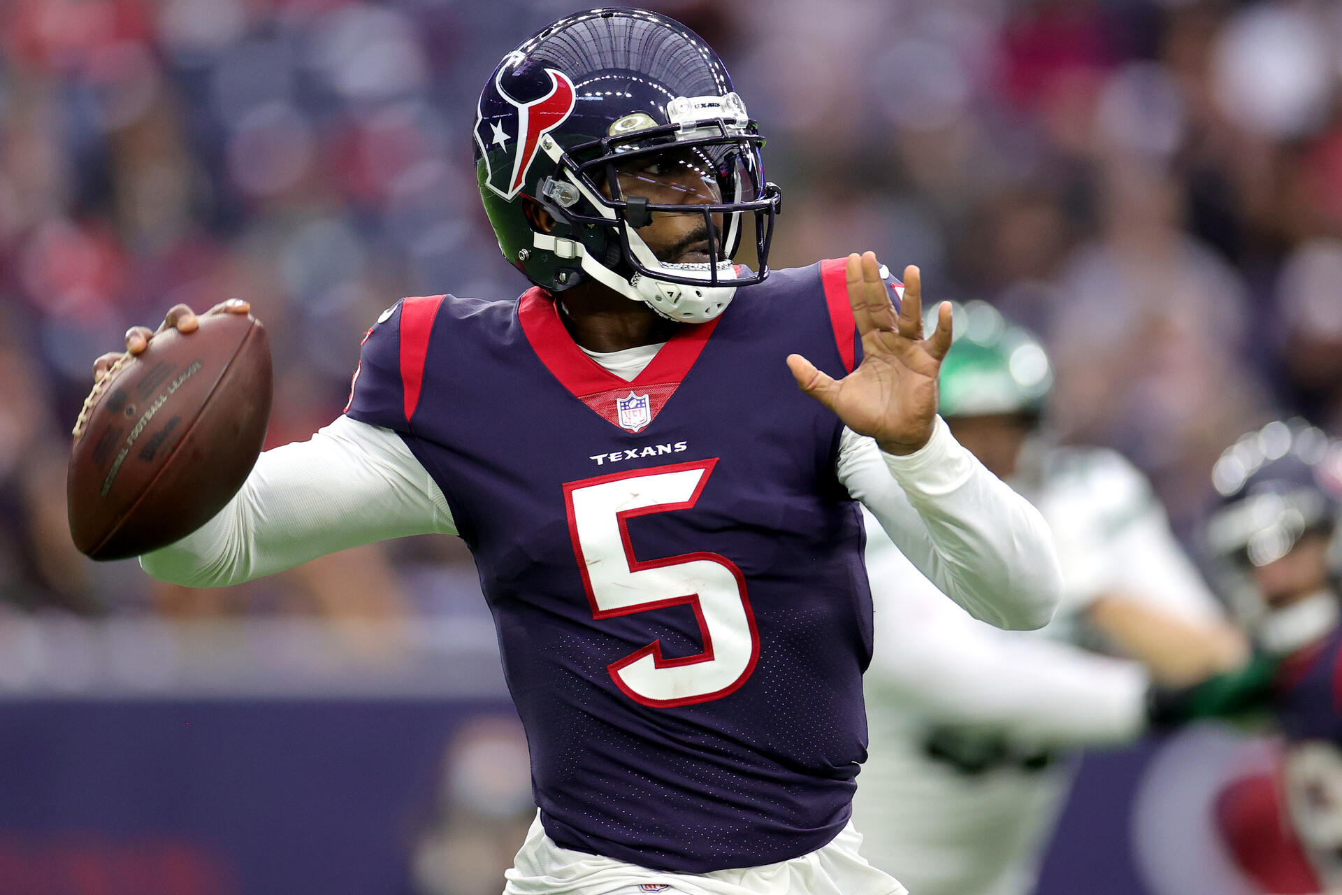 Tyrod Taylor #5 of the Houston Texans throws the ball down the field in the second quarter against the New York Jets at NRG Stadium on November 28, 2021 in Houston, Texas.