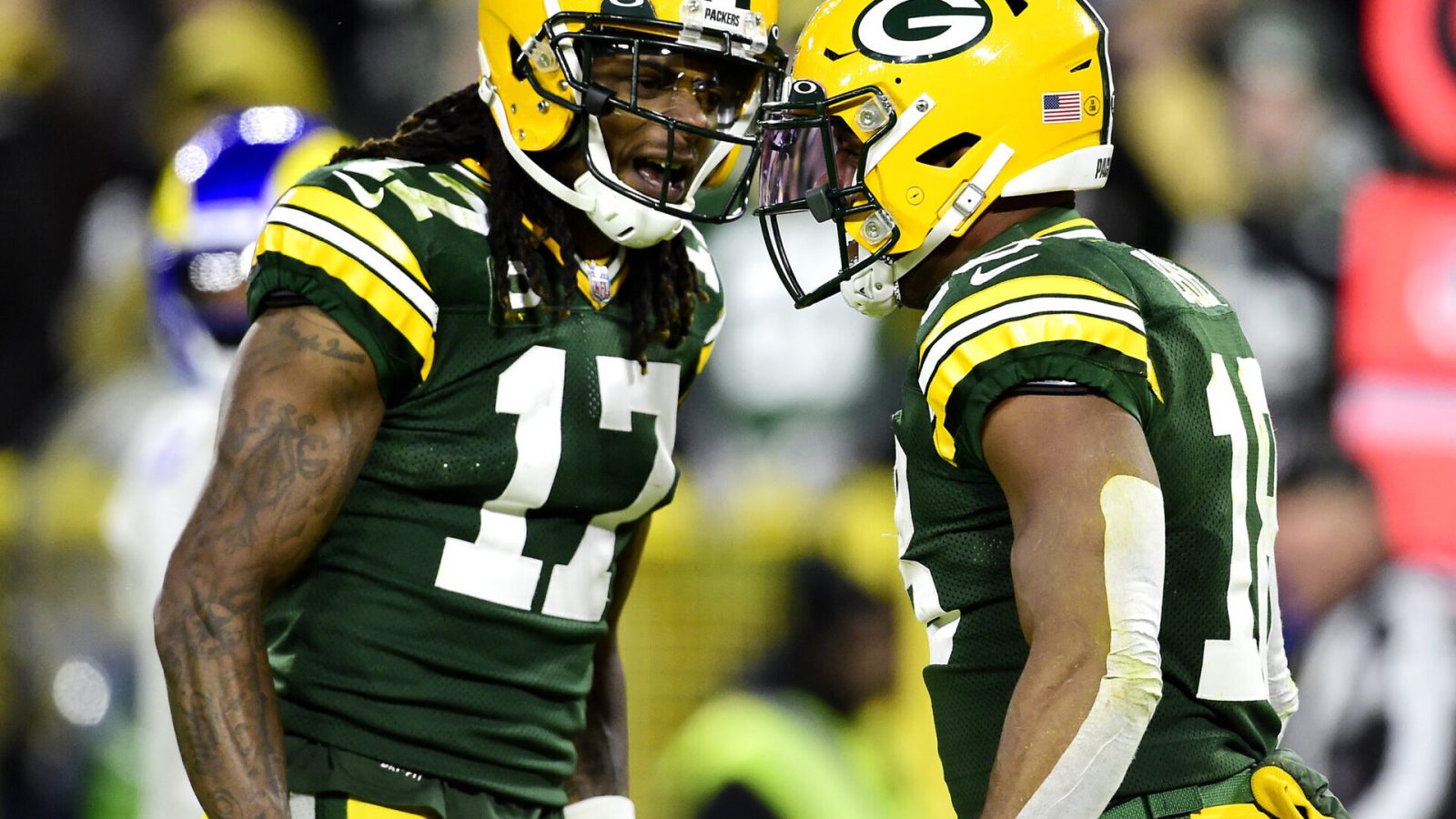 Randall Cobb #18 of the Green Bay Packers celebrates his touchdown catch with Davante Adams #17 during the second quarter against the Los Angeles Rams at Lambeau Field on November 28, 2021 in Green Bay, Wisconsin.