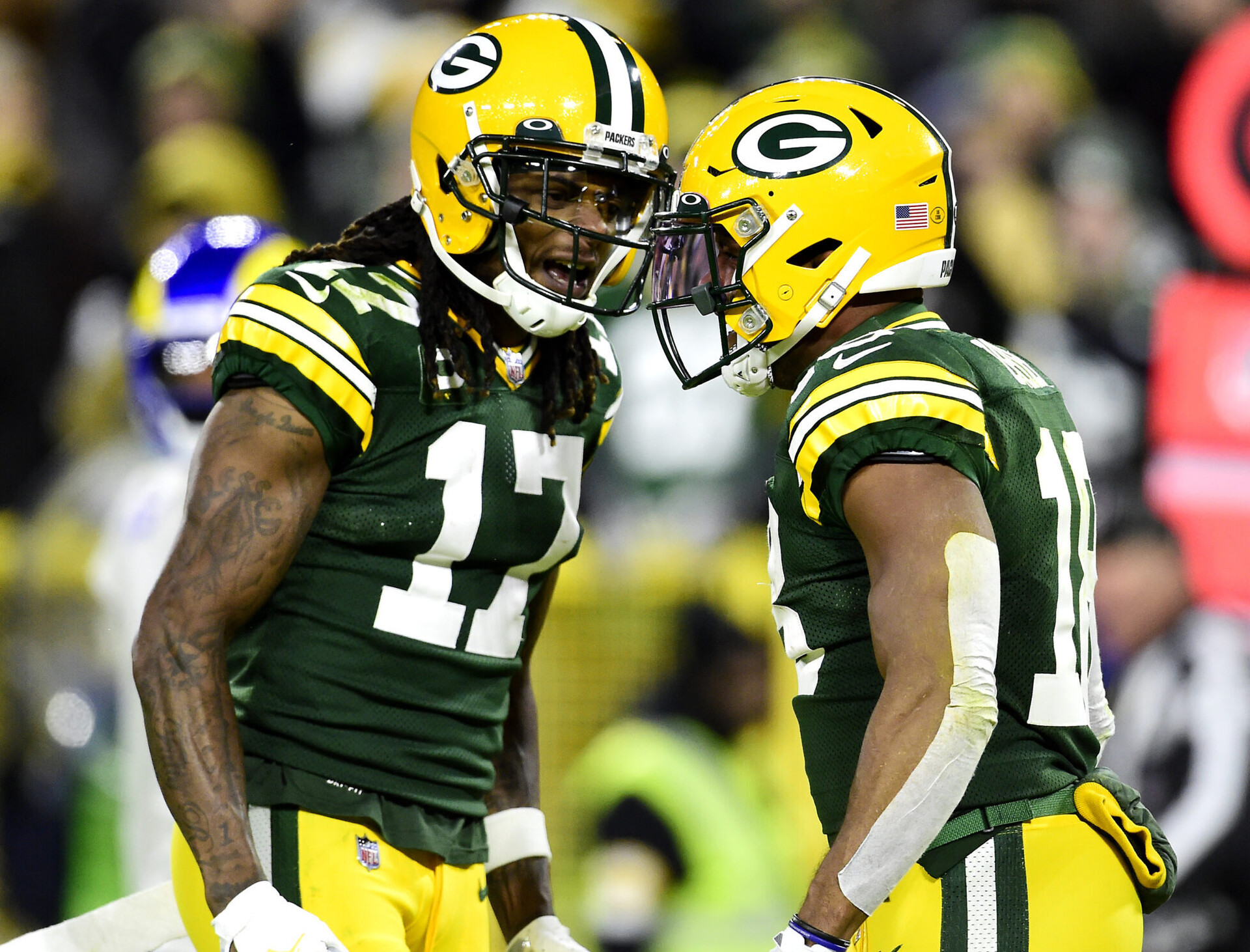 Randall Cobb #18 of the Green Bay Packers celebrates his touchdown catch with Davante Adams #17 during the second quarter against the Los Angeles Rams at Lambeau Field on November 28, 2021 in Green Bay, Wisconsin.