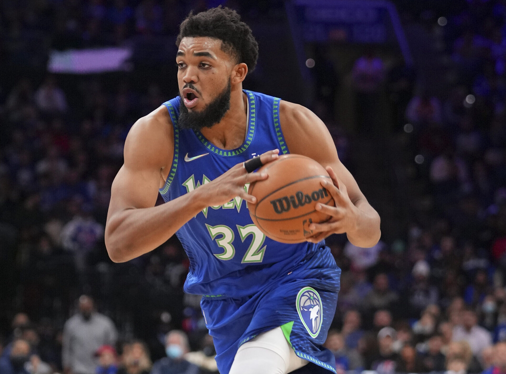 Karl-Anthony Towns #32 of the Minnesota Timberwolves drives to the basket against the Philadelphia 76ers at the Wells Fargo Center on November 27, 2021 in Philadelphia, Pennsylvania. The Timberwolves defeated the 76ers 121-120 in double overtime.
