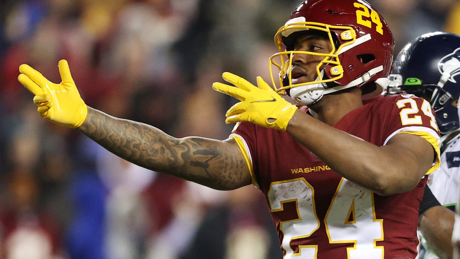 Antonio Gibson #24 of the Washington Football Team reacts after a first down against the Seattle Seahawks during the third quarter at FedExField on November 29, 2021 in Landover, Maryland.