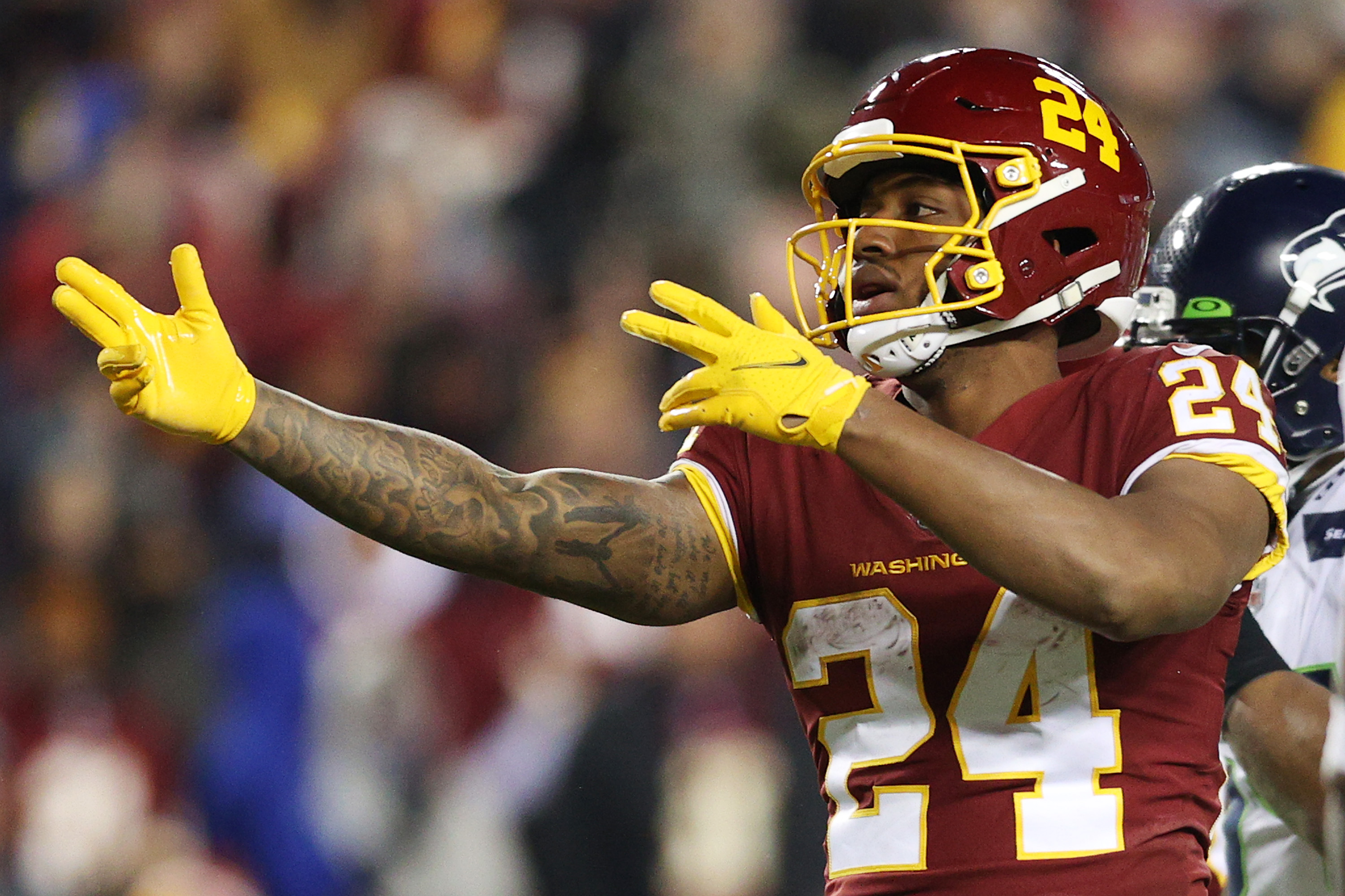 Antonio Gibson #24 of the Washington Football Team reacts after a first down against the Seattle Seahawks during the third quarter at FedExField on November 29, 2021 in Landover, Maryland.