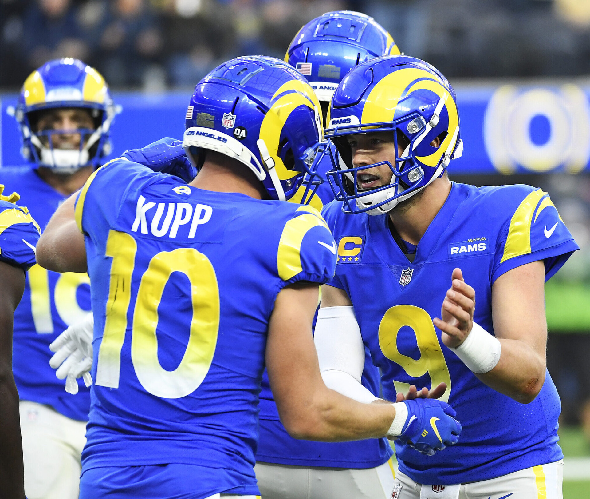 Cooper Kupp #10 of the Los Angeles Rams celebrates his touchdown with Matthew Stafford #9 of the Los Angeles Rams during the third quarter against the Jacksonville Jaguars at SoFi Stadium on December 05, 2021 in Inglewood, California.