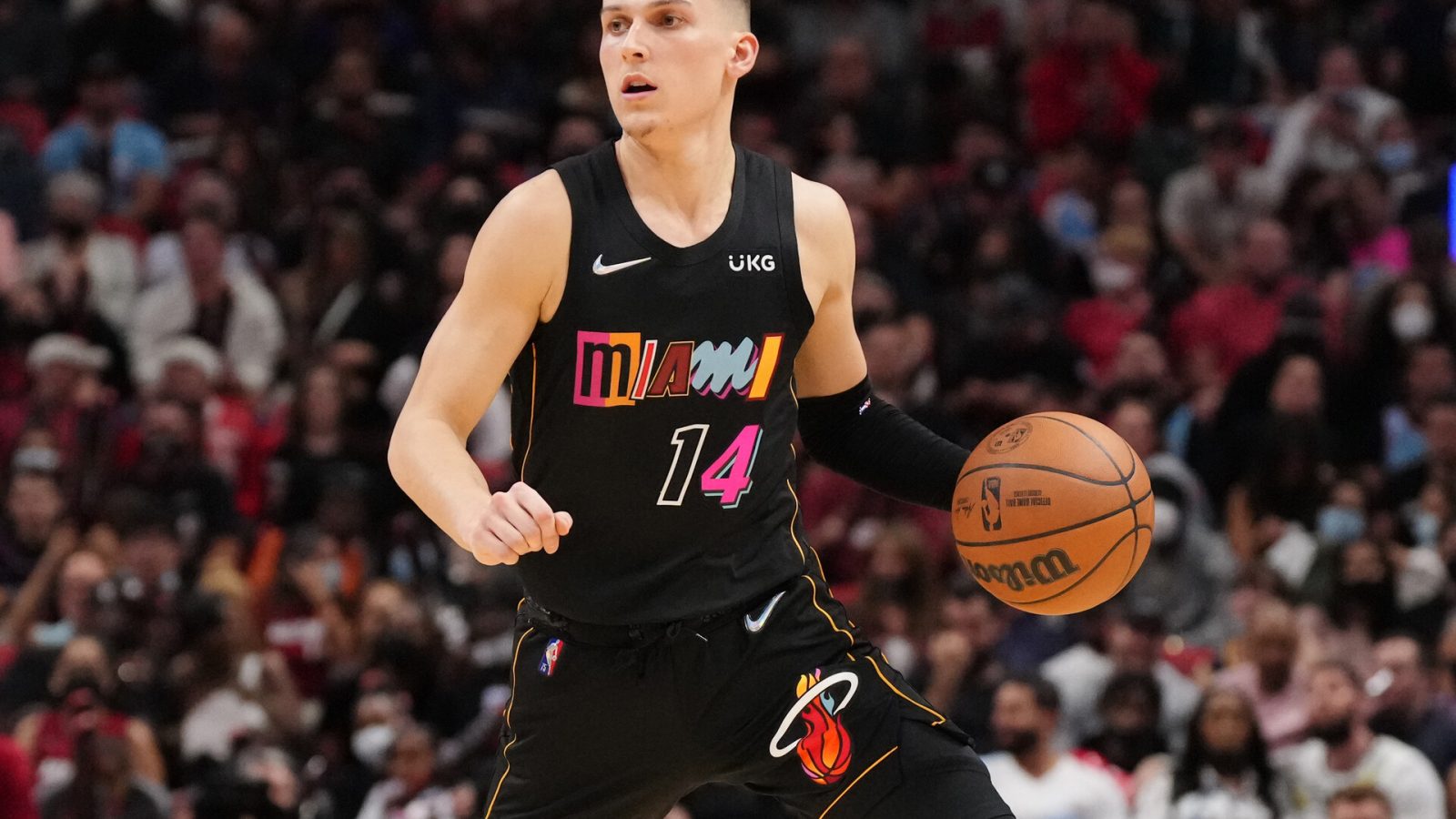 Tyler Herro #14 of the Miami Heat controls the ball against the Indiana Pacers during the second half at FTX Arena on December 21, 2021 in Miami, Florida.