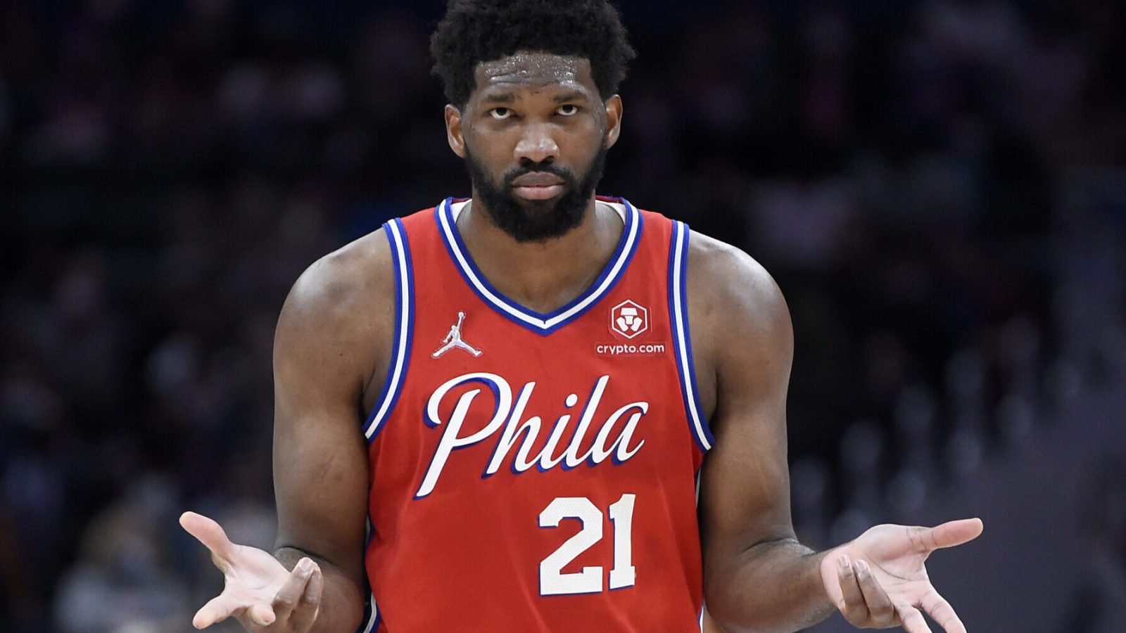 Joel Embiid #21 of the Philadelphia 76ers celebrates in the second half against the Washington Wizards at Capital One Arena on December 26, 2021 in Washington, DC.