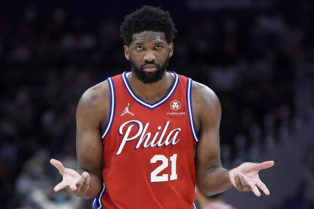 Joel Embiid #21 of the Philadelphia 76ers celebrates in the second half against the Washington Wizards at Capital One Arena on December 26, 2021 in Washington, DC.