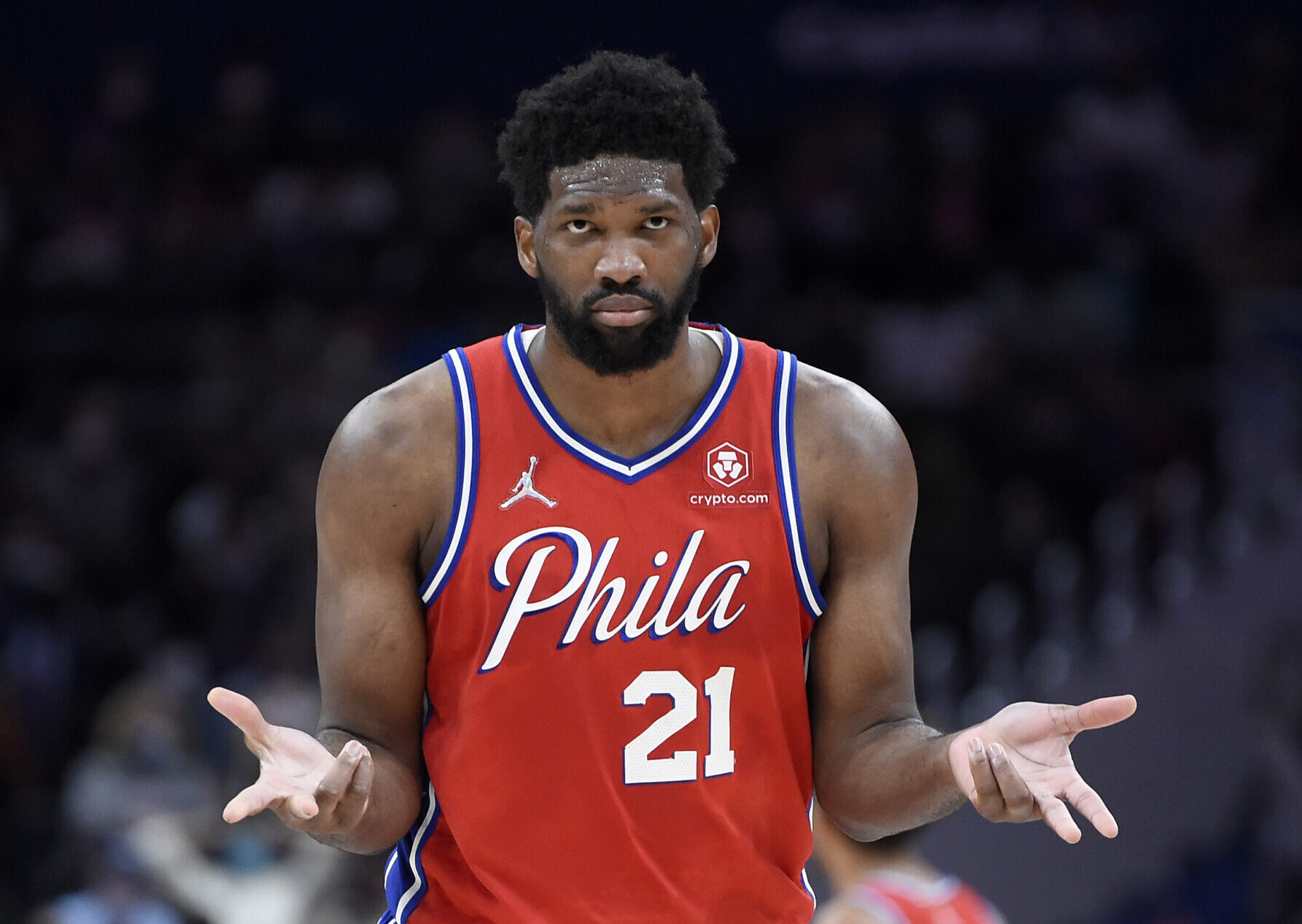 Joel Embiid #21 of the Philadelphia 76ers celebrates in the second half against the Washington Wizards at Capital One Arena on December 26, 2021 in Washington, DC.