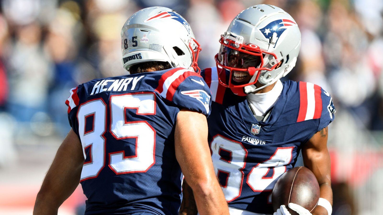 New England Patriots tight end Hunter Henry (85) celebrates with wide receiver Kendrick Bourne (84) after scoring a touchdown against the New York Jets during the first half at Gillette Stadium.