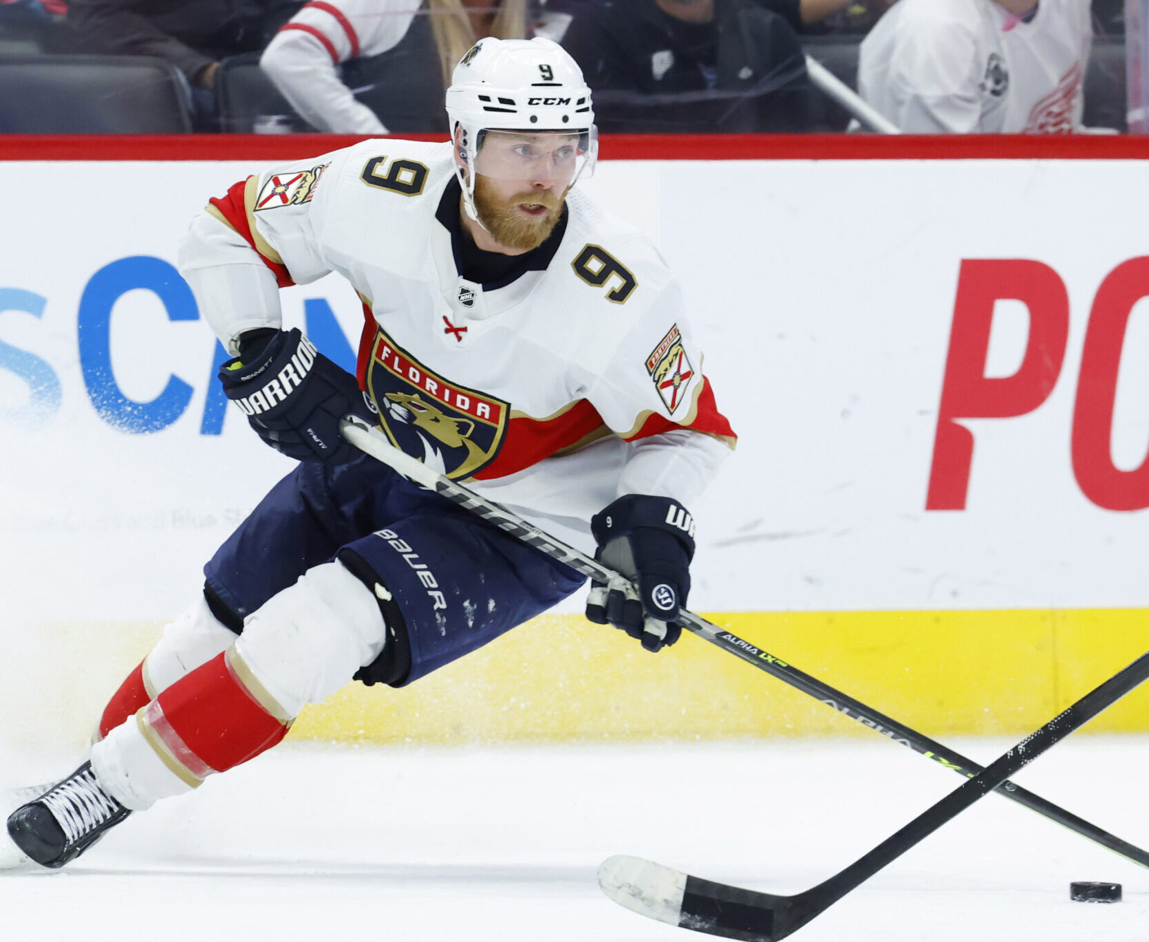 Florida Panthers center Sam Bennett (9) skates with the puck against the Detroit Red Wings at Little Caesars Arena.