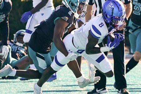 Nov 13, 2021; Conway, South Carolina, USA; Coastal Carolina Chanticleers cornerback D'Jordan Strong (2) tackles Georgia State Panthers wide receiver Ja'Cyais Credle (8) at Brooks Stadium. Mandatory Credit: David Yeazell-USA TODAY Sports