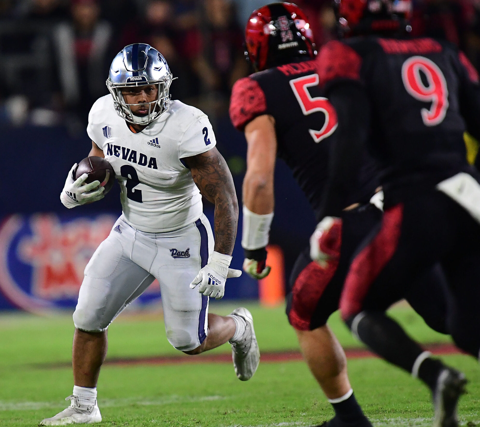 Nevada Wolf Pack running back Devonte Lee runs the ball against the San Diego State Aztecs