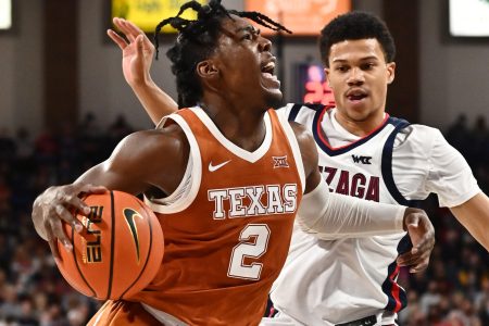 Nov 13, 2021; Spokane, Washington, USA; Texas Longhorns guard Marcus Carr (2) drives the lane against Gonzaga Bulldogs guard Rasir Bolton (45) in the second half at McCarthey Athletic Center. Gonzaga won 86-74. Mandatory Credit: James Snook-USA TODAY Sports