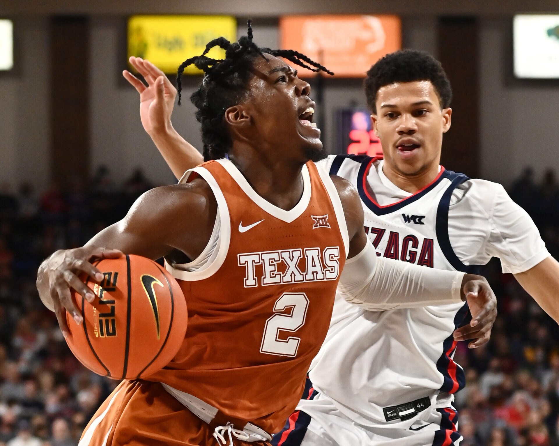 Nov 13, 2021; Spokane, Washington, USA; Texas Longhorns guard Marcus Carr (2) drives the lane against Gonzaga Bulldogs guard Rasir Bolton (45) in the second half at McCarthey Athletic Center. Gonzaga won 86-74. Mandatory Credit: James Snook-USA TODAY Sports