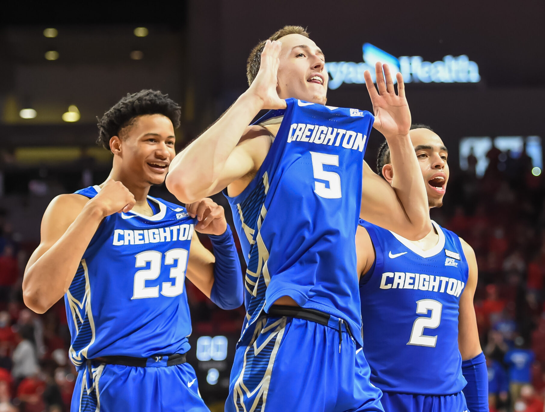 Nov 16, 2021; Lincoln, Nebraska, USA; Creighton Bluejays guard Alex O'Connell (5) and guard Trey Alexander (23) and guard Ryan Nembhard (2) react after the win against the Nebraska Cornhuskers at Pinnacle Bank Arena.