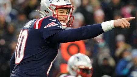 Super Bowl Odds, Nov 28, 2021; Foxborough, Massachusetts, USA; New England Patriots quarterback Mac Jones (10) on the line of scrimmage against the Tennessee Titans in the second half at Gillette Stadium.