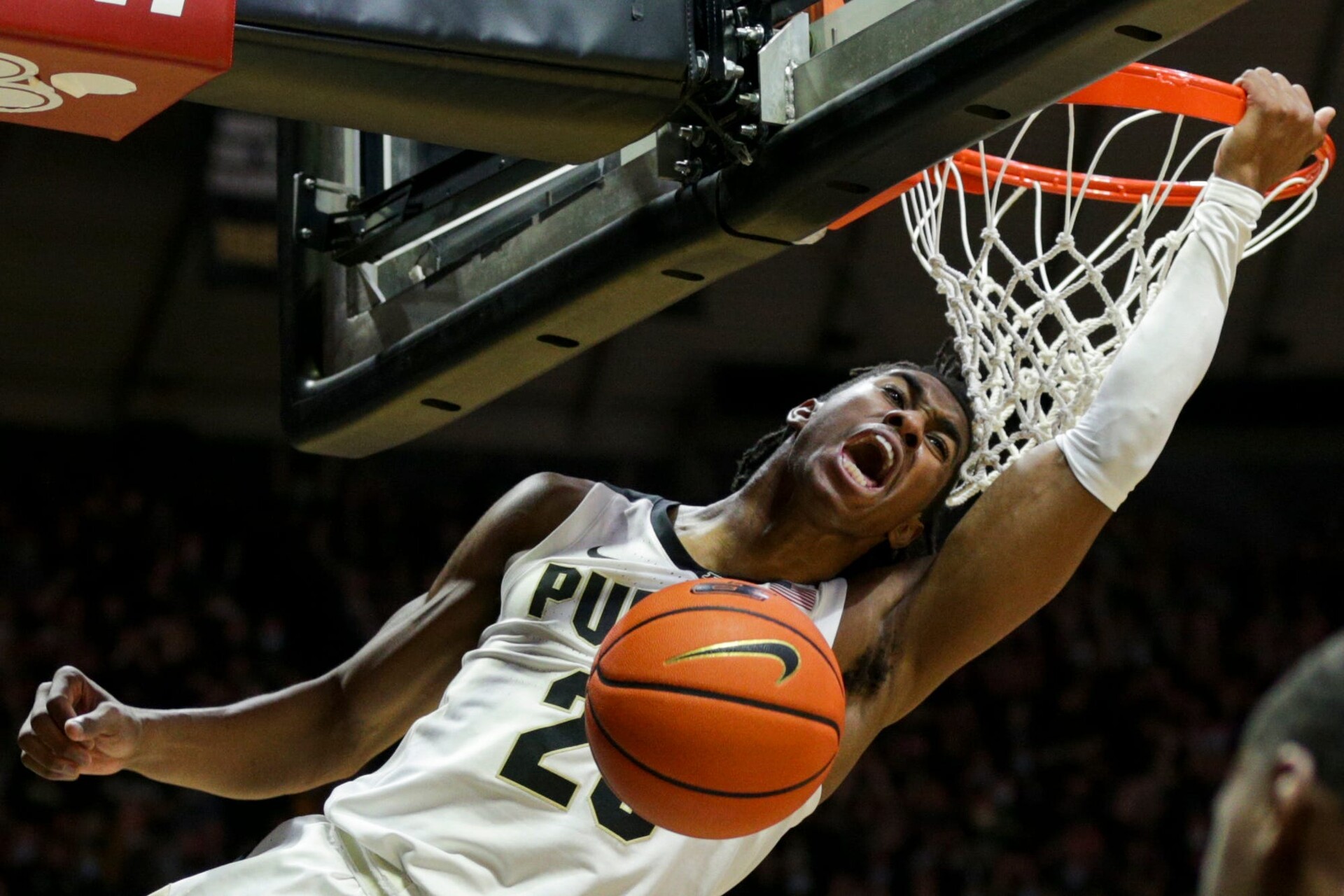 Purdue guard Jaden Ivey reacts after dunking a basketball during a game against Iowa