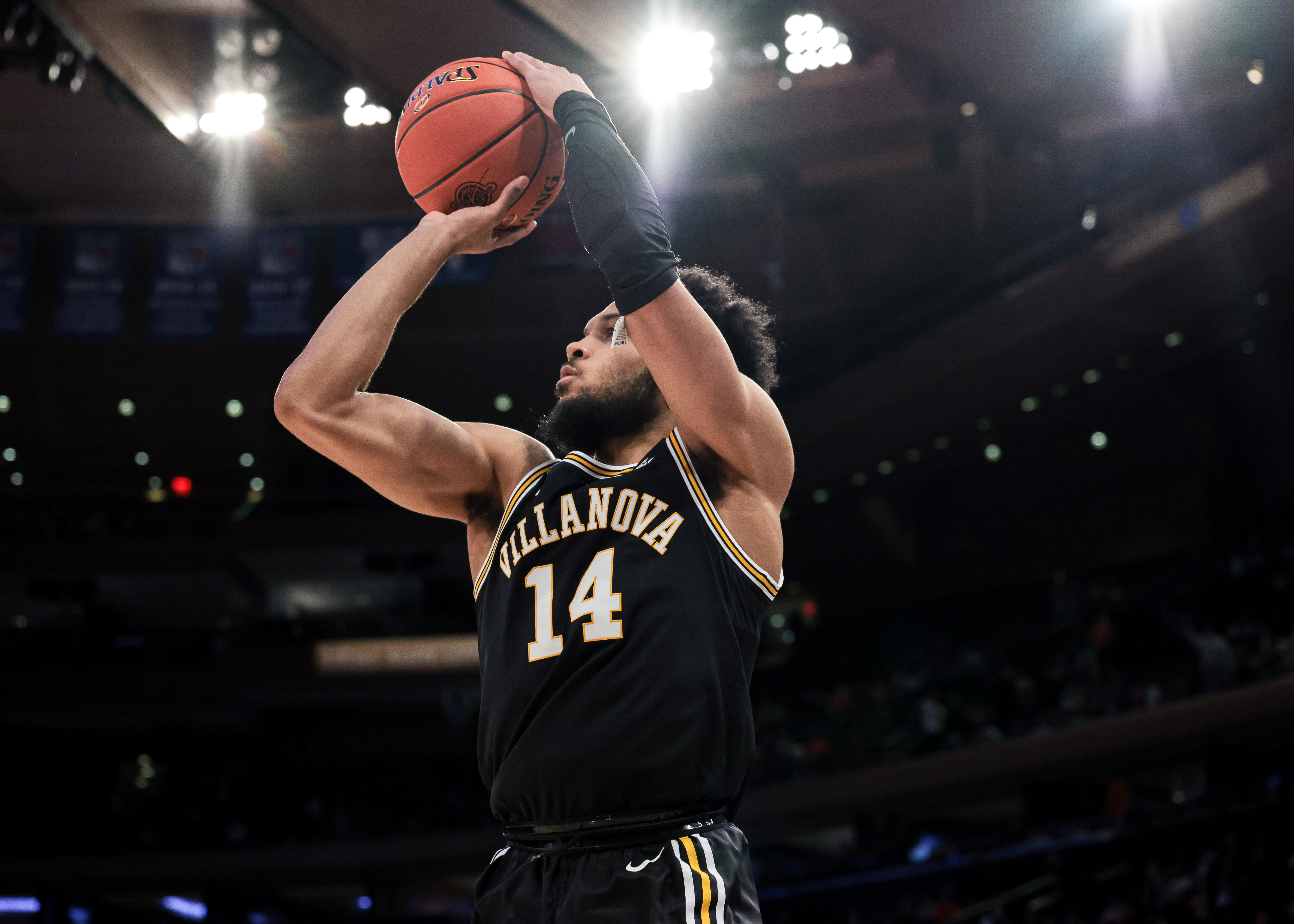 Villanova Wildcats guard Caleb Daniels shoots the ball against the Syracuse Orange