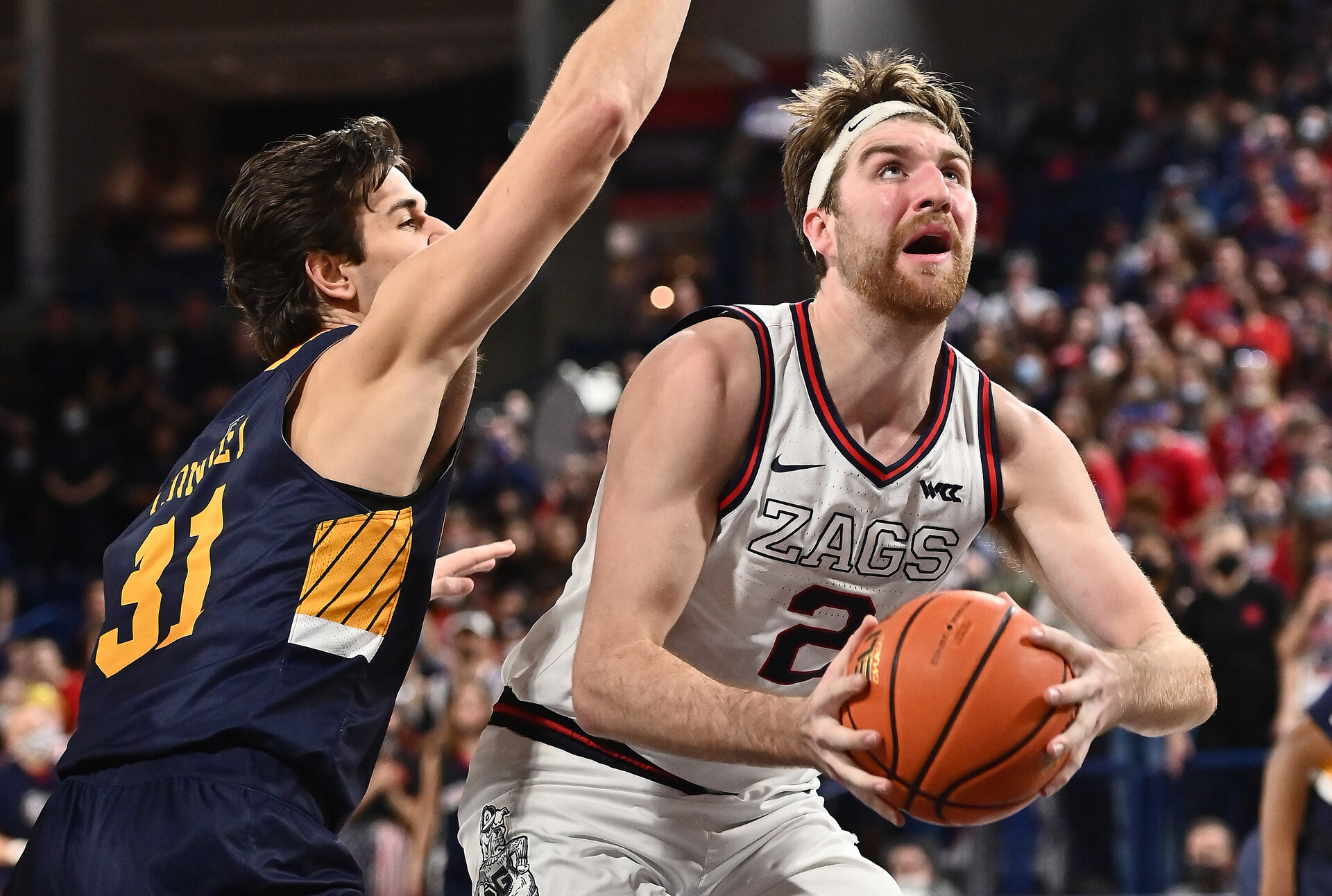 Gonzaga Bulldogs forward Drew Timme goes up for a shot against Merrimack Warriors forward Justin Connolly