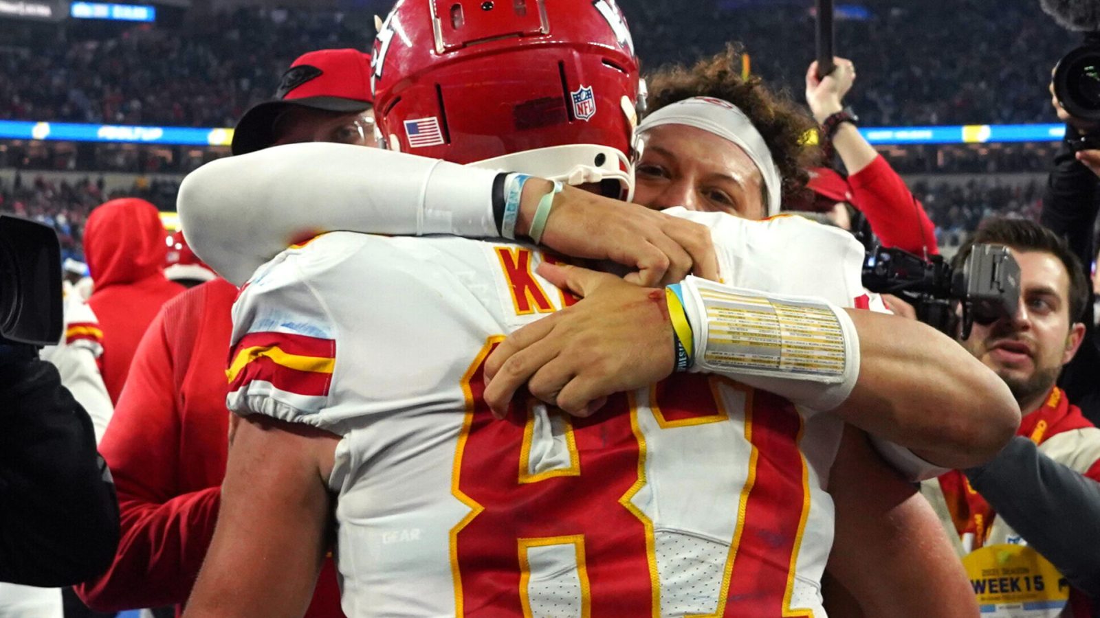 Dec 16, 2021; Inglewood, California, USA; Kansas City Chiefs tight end Travis Kelce (87) celebrates with quarterback Patrick Mahomes (15) after scoring a touchdown in overtime against the Los Angeles Chargers at SoFi Stadium. Mandatory Credit: Kirby Lee-USA TODAY Sports