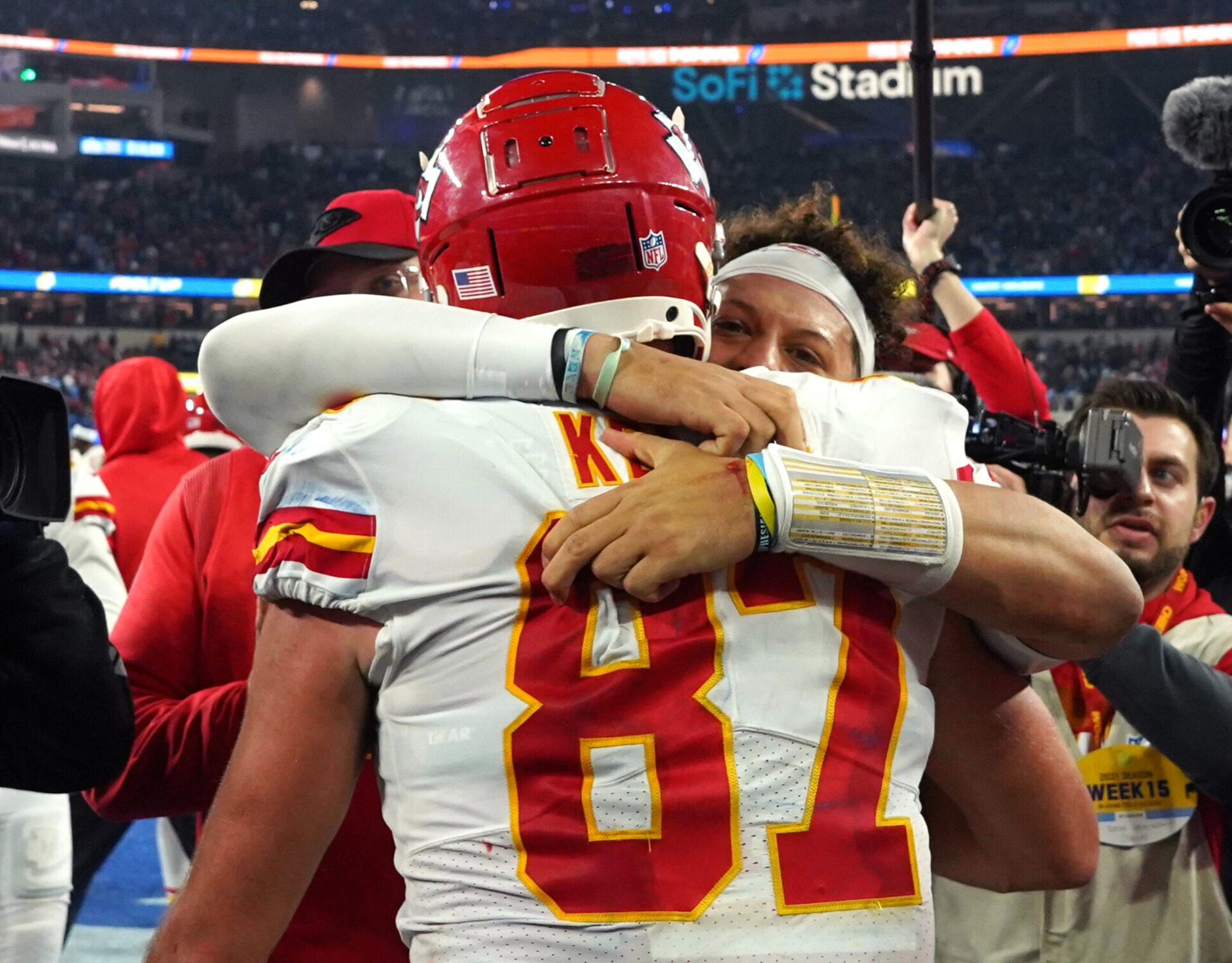 Dec 16, 2021; Inglewood, California, USA; Kansas City Chiefs tight end Travis Kelce (87) celebrates with quarterback Patrick Mahomes (15) after scoring a touchdown in overtime against the Los Angeles Chargers at SoFi Stadium. Mandatory Credit: Kirby Lee-USA TODAY Sports