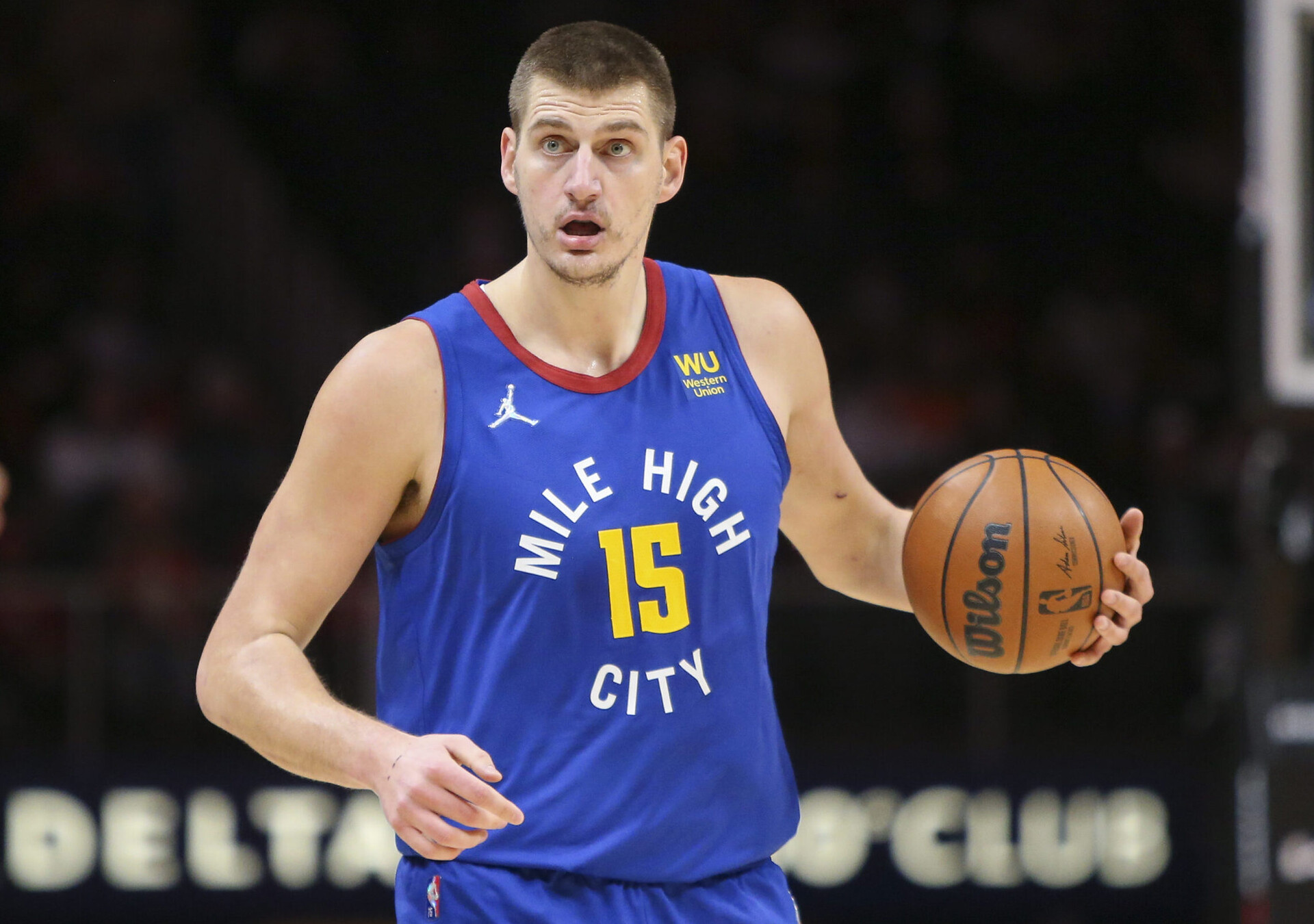 Denver Nuggets center Nikola Jokic handles the ball against the Atlanta Hawks