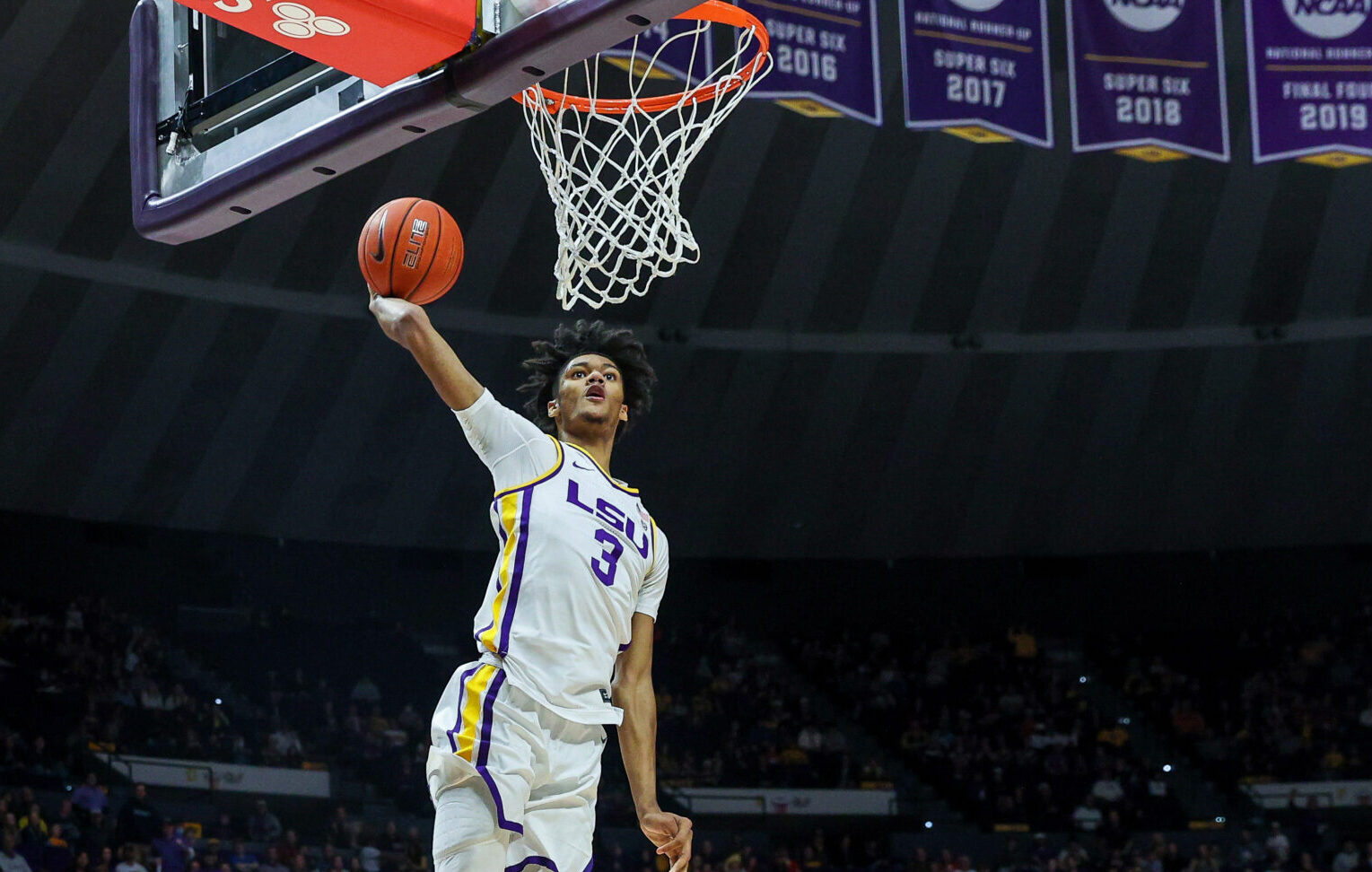 LSU Tigers forward Alex Fudge dunks the ball in a game against the Lipscomb Bisons