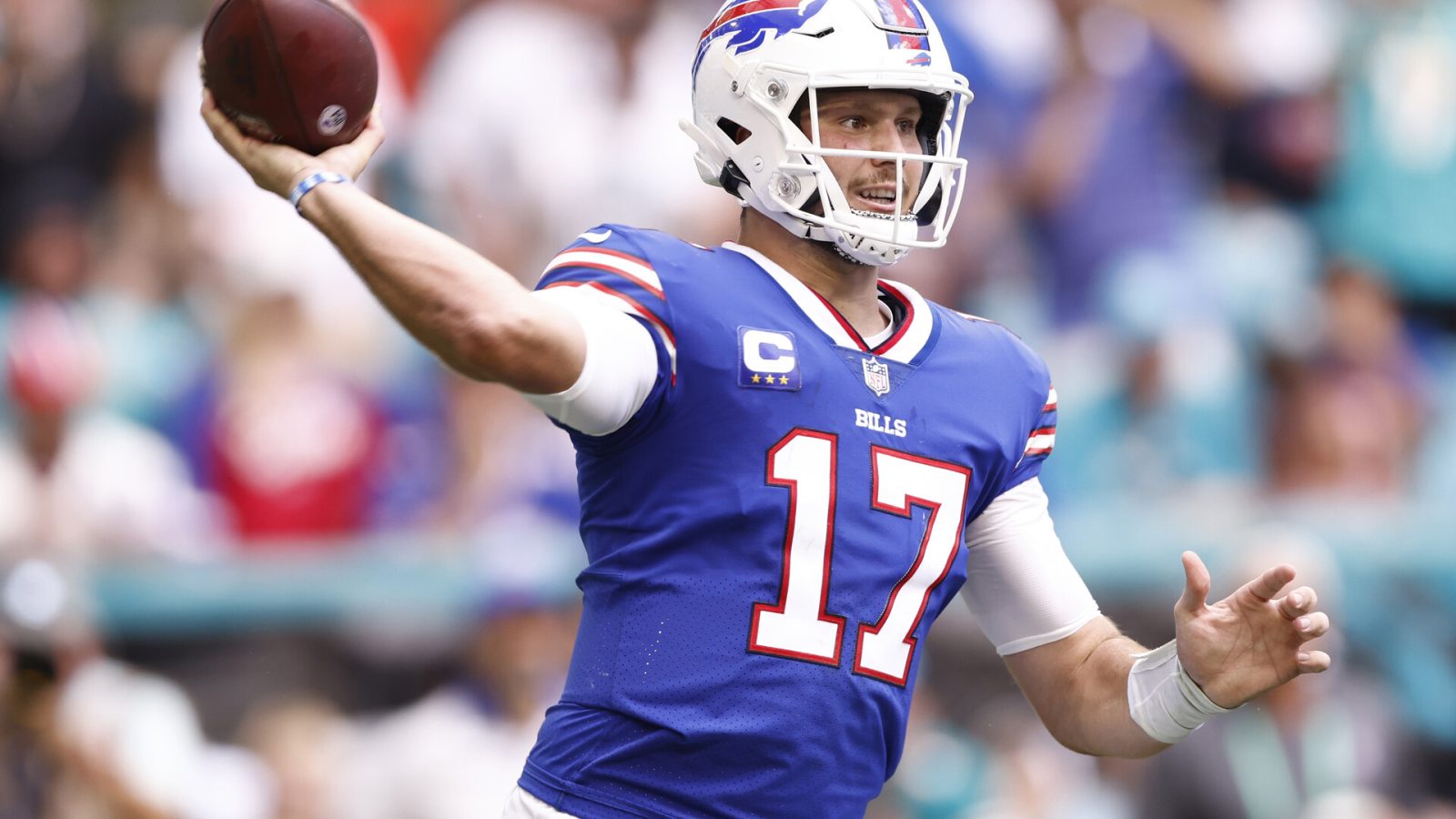 Quarterback Josh Allen #17 of the Buffalo Bills passes the ball in the first half of the game against the Miami Dolphins at Hard Rock Stadium on September 19, 2021 in Miami Gardens, Florida.