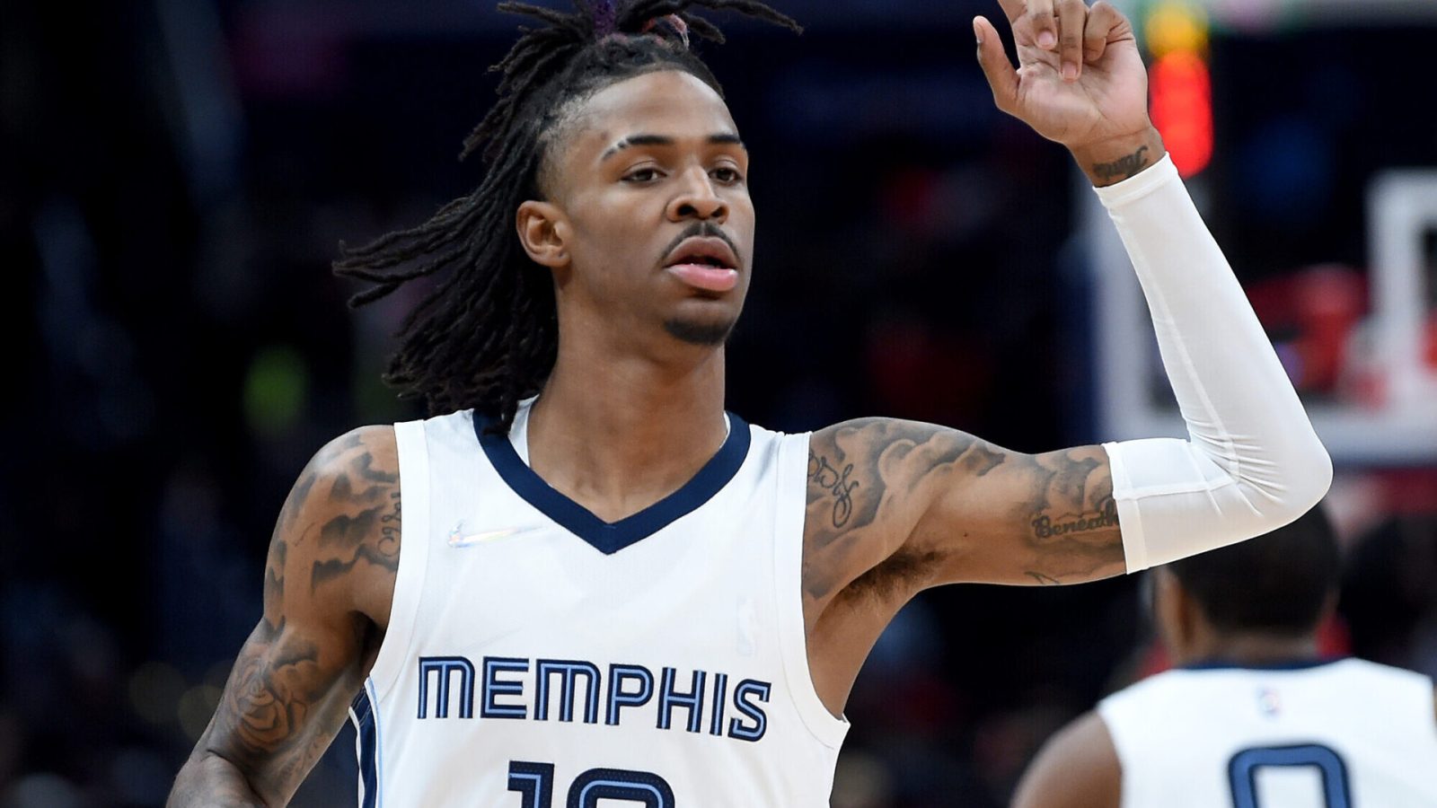 Ja Morant #12 of the Memphis Grizzlies plays against the Washington Wizards at Capital One Arena on November 05, 2021 in Washington, DC