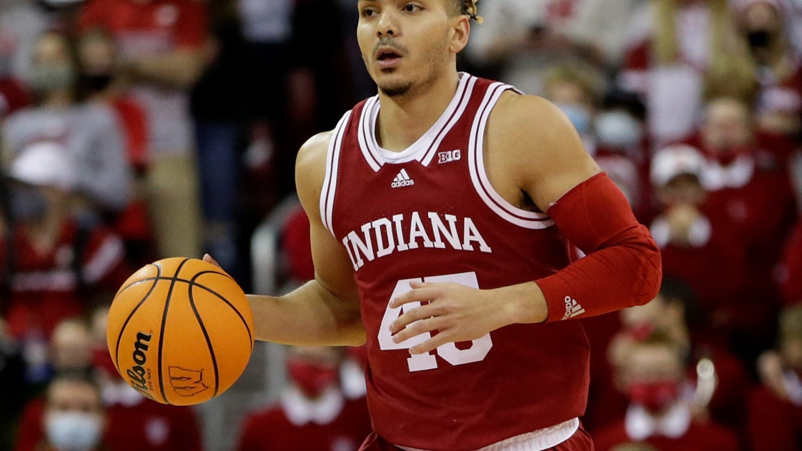 Parker Stewart #45 of the Indiana Hoosiers dribbles the basketball up court during the first half of the game against the Wisconsin Badgers at Kohl Center on December 08, 2021 in Madison, Wisconsin.