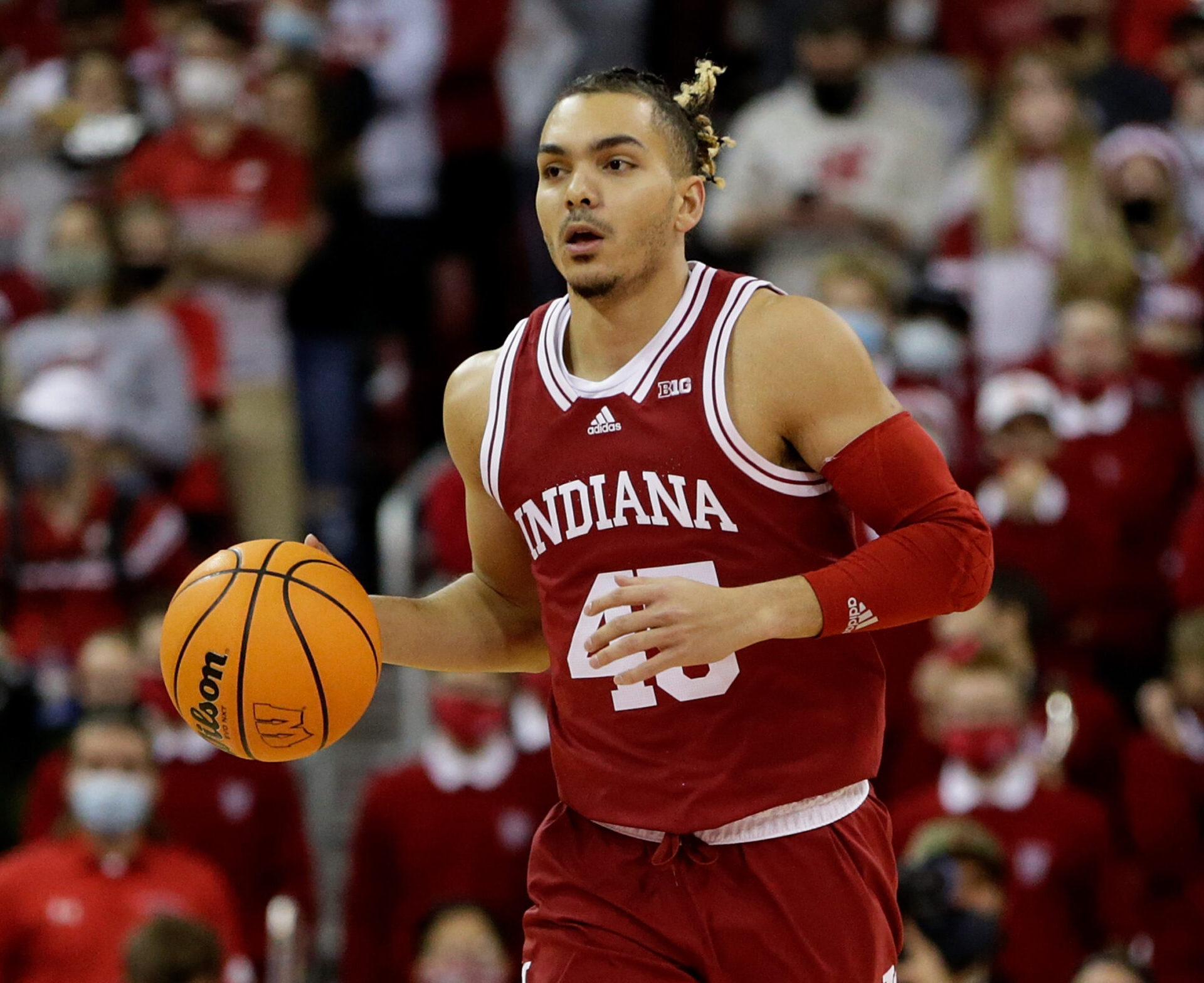 Parker Stewart #45 of the Indiana Hoosiers dribbles the basketball up court during the first half of the game against the Wisconsin Badgers at Kohl Center on December 08, 2021 in Madison, Wisconsin.