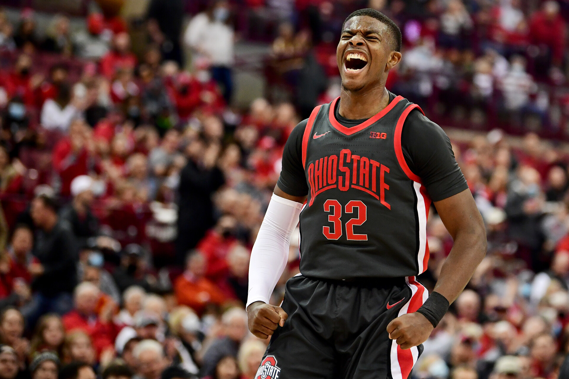 E.J. Liddell #32 of the Ohio State Buckeyes celebrates a basket during the first half of a game against the Wisconsin Badgers at Value City Arena on December 11, 2021 in Columbus, Ohio.