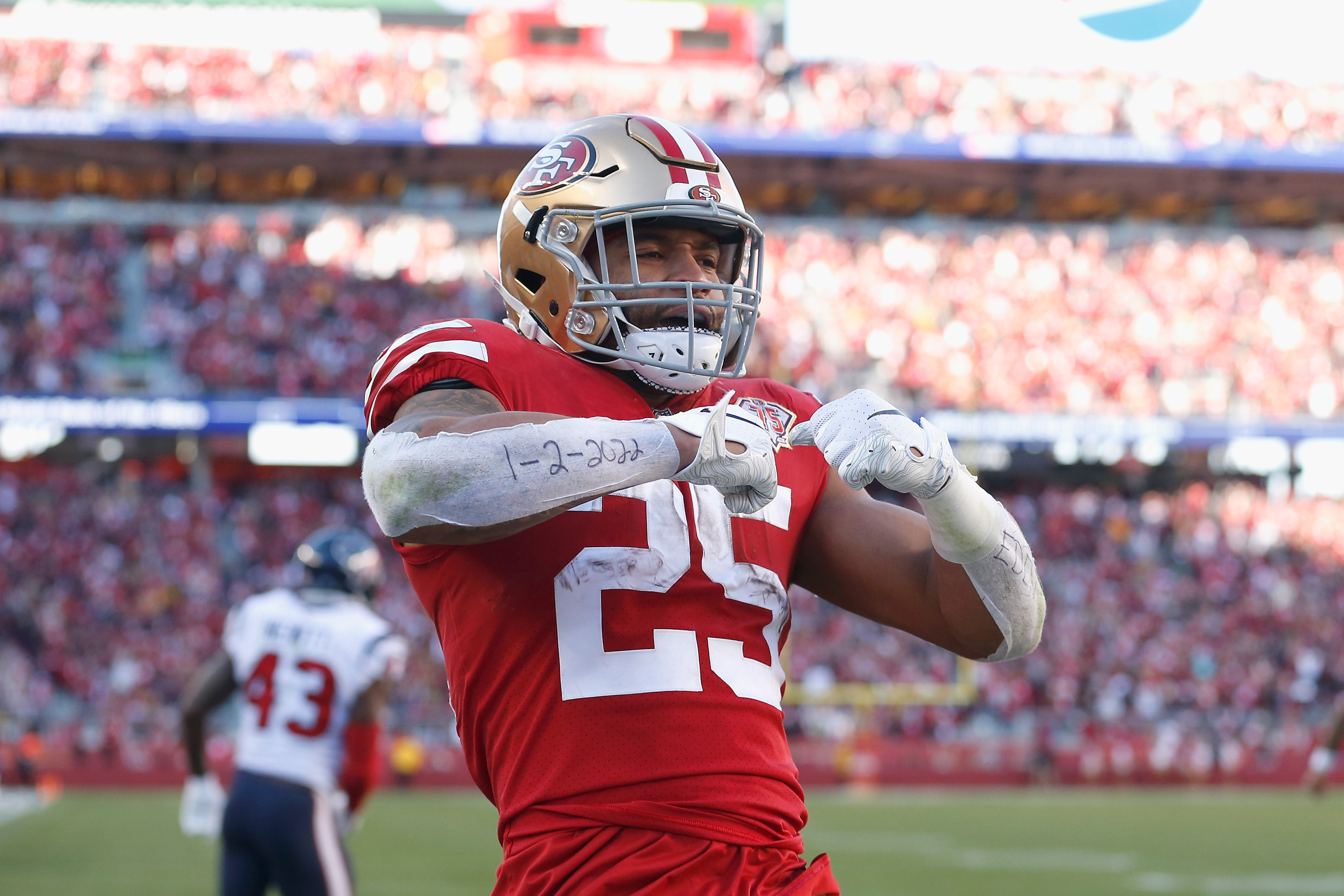 Elijah Mitchell #25 of the San Francisco 49ers celebrates after scoring a touchdown in the third quarter against the Houston Texans at Levi's Stadium on January 02, 2022 in Santa Clara, California.