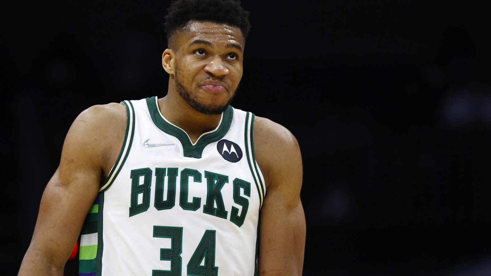Giannis Antetokounmpo #34 of the Milwaukee Bucks reacts following a play during the second half of the game against the Charlotte Hornets at Spectrum Center on January 08, 2022 in Charlotte, North Carolina.