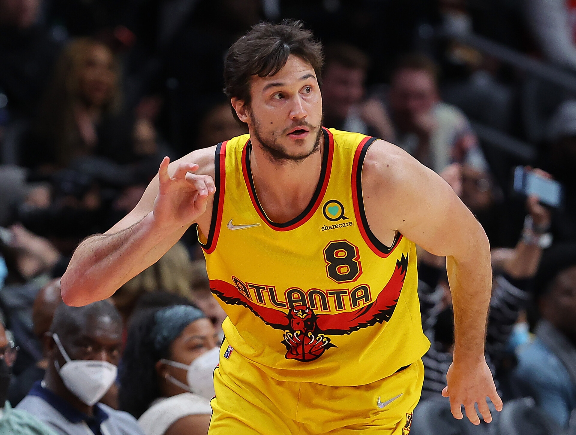 Danilo Gallinari #8 of the Atlanta Hawks reacts after hitting a three-point basket against the New York Knicks during the first half at State Farm Arena on January 15, 2022 in Atlanta, Georgia