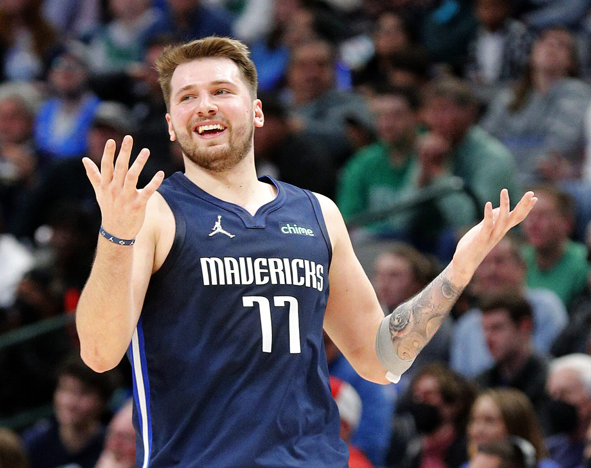 Luka Doncic #77 of the Dallas Mavericks reacts after a foul call in the second half against the Oklahoma City Thunder at American Airlines Center on January 17, 2022 in Dallas, Texas.