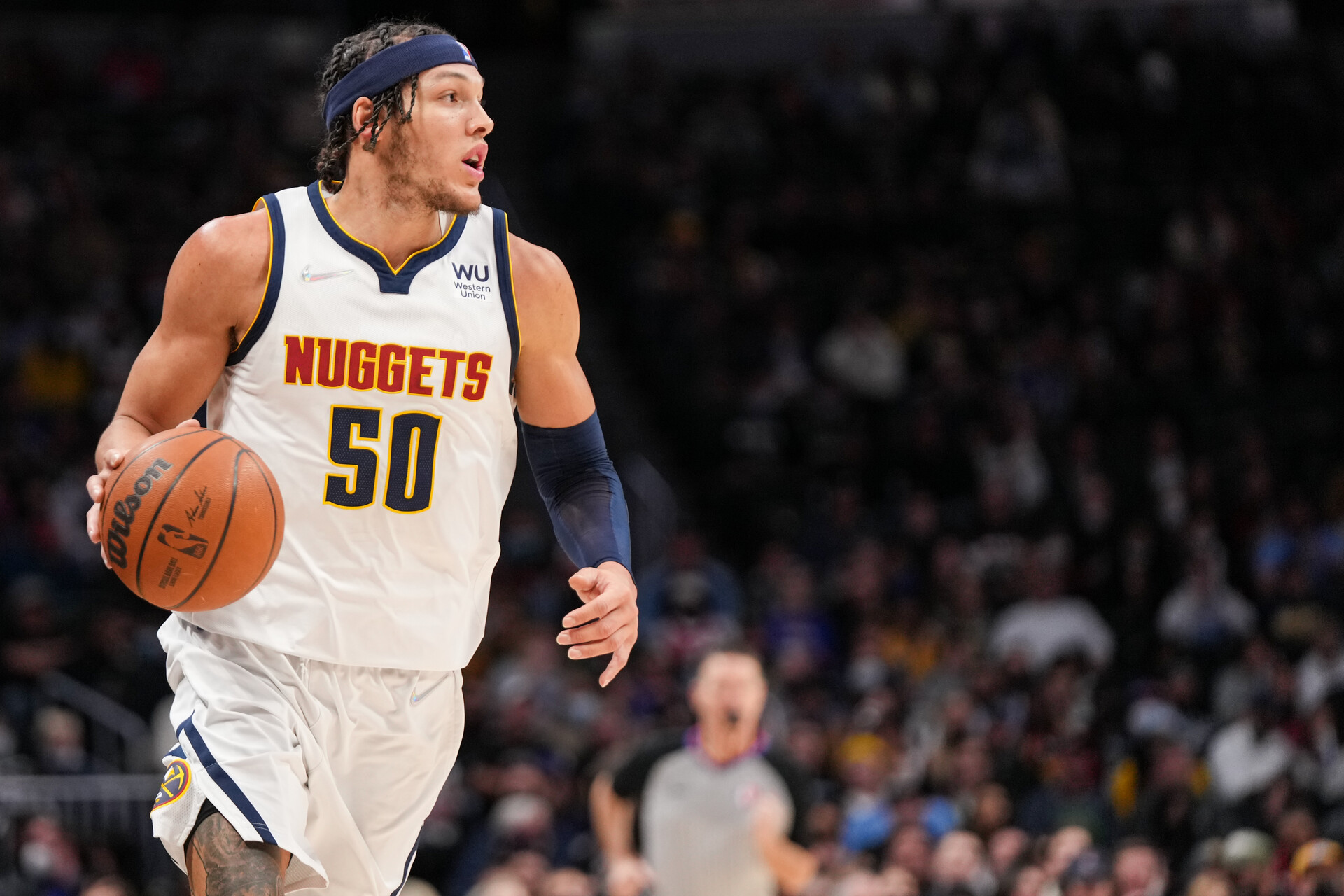 Aaron Gordon #50 of the Denver Nuggets dribbles against the Memphis Grizzlies at Ball Arena on January 21, 2022 in Denver, Colorado.