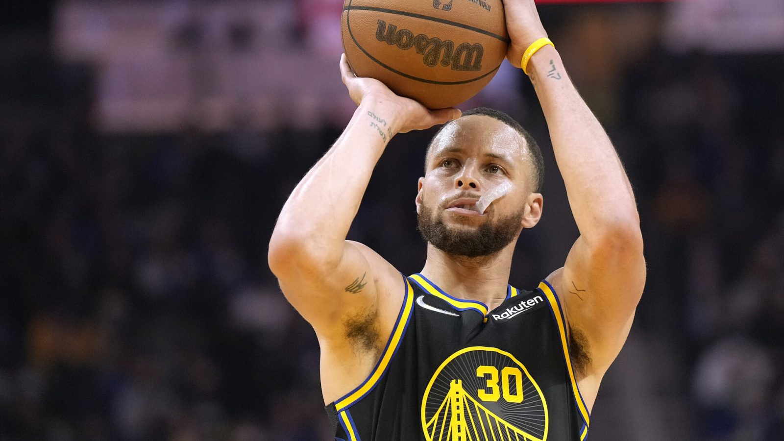Stephen Curry #30 of the Golden State Warriors shoots a fouled shot against the Utah Jazz during the first half of an NBA basketball game at Chase Center on January 23, 2022 in San Francisco, California.