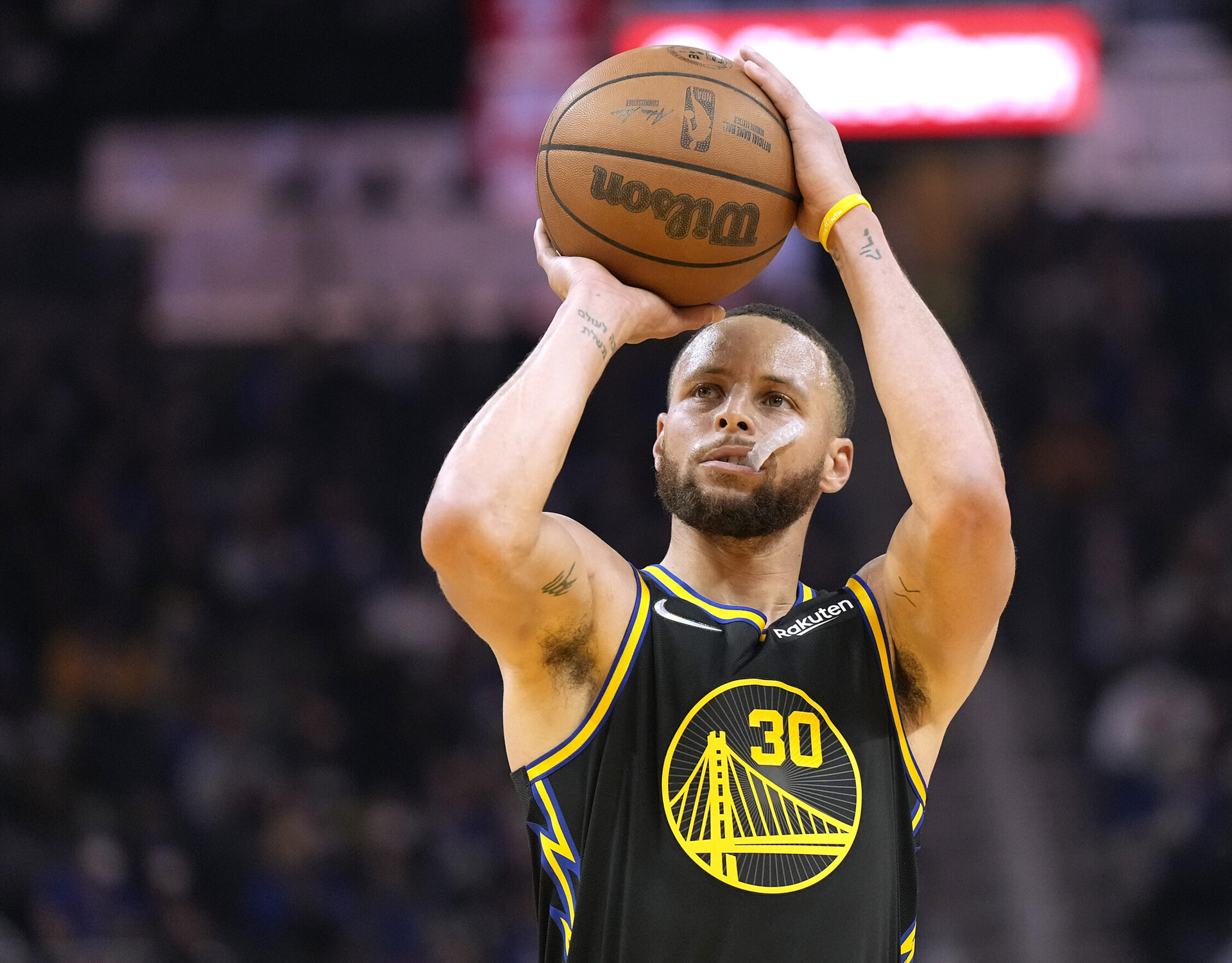 Stephen Curry #30 of the Golden State Warriors shoots a fouled shot against the Utah Jazz during the first half of an NBA basketball game at Chase Center on January 23, 2022 in San Francisco, California.