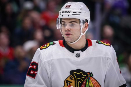 Chicago Blackhawks left wing Alex DeBrincat (12) in action during the game between the Stars and the Blackhawks at the American Airlines Center