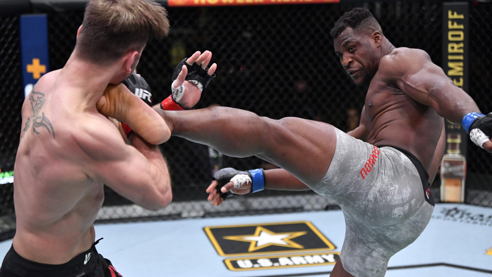 Mar 27, 2021; Las Vegas, NV, USA; Francis Ngannou of Cameroon kicks Stipe Miocic in their UFC heavyweight championship fight during the UFC 260 event at UFC APEX on March 27, 2021 in Las Vegas, Nevada. Mandatory Credit: Jeff Bottari/Handout Photo via USA TODAY Sports