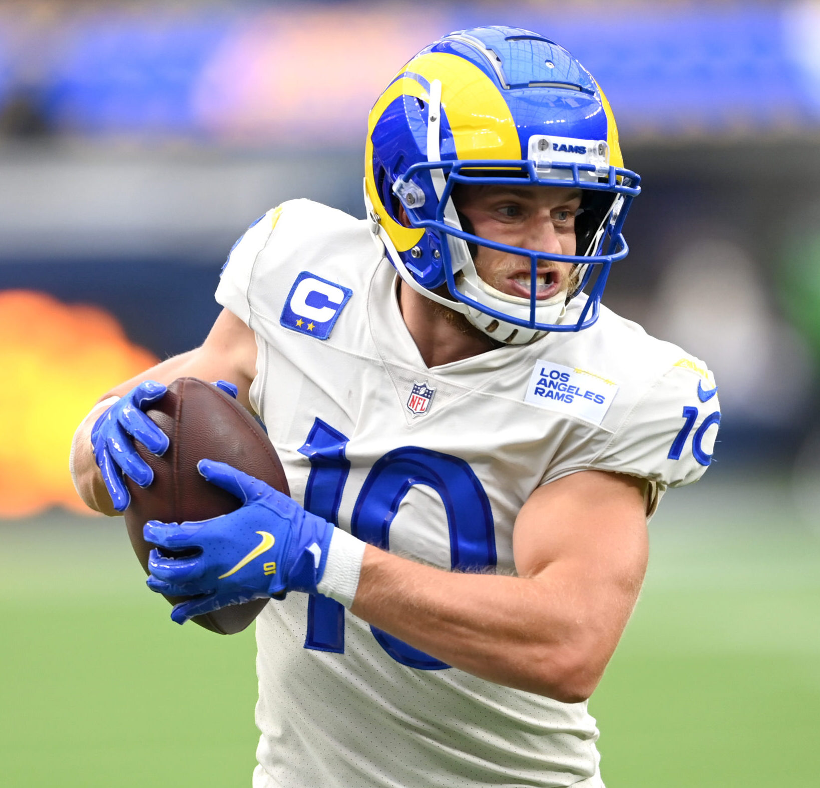 Los Angeles Rams wide receiver Cooper Kupp runs for a first down after making a catch against the Tampa Bay Buccaneers