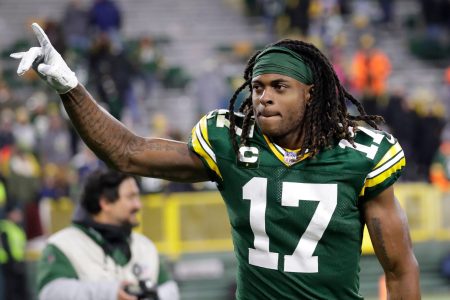 Green Bay Packers wide receiver Davante Adams celebrates a victory against the Los Angeles Rams as he exits the field